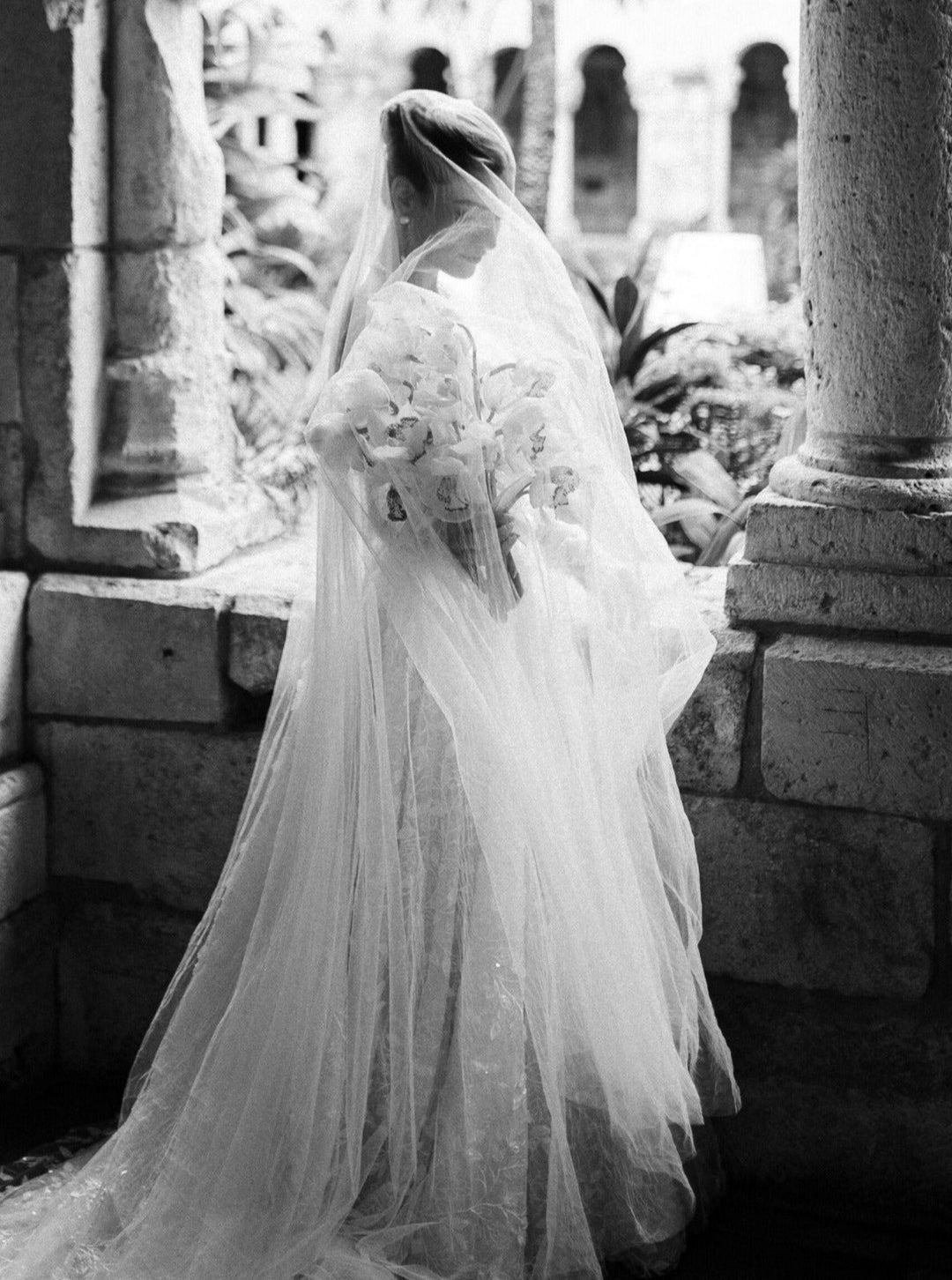 Cassandra wedding veil with long blusher on bride Grace.