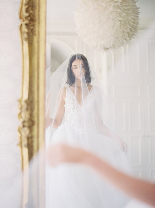 Bridal veil with blusher.