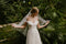 Bride wearing the ARIA sheer wedding veil with blusher with an off-the-shoulder wedding dress.