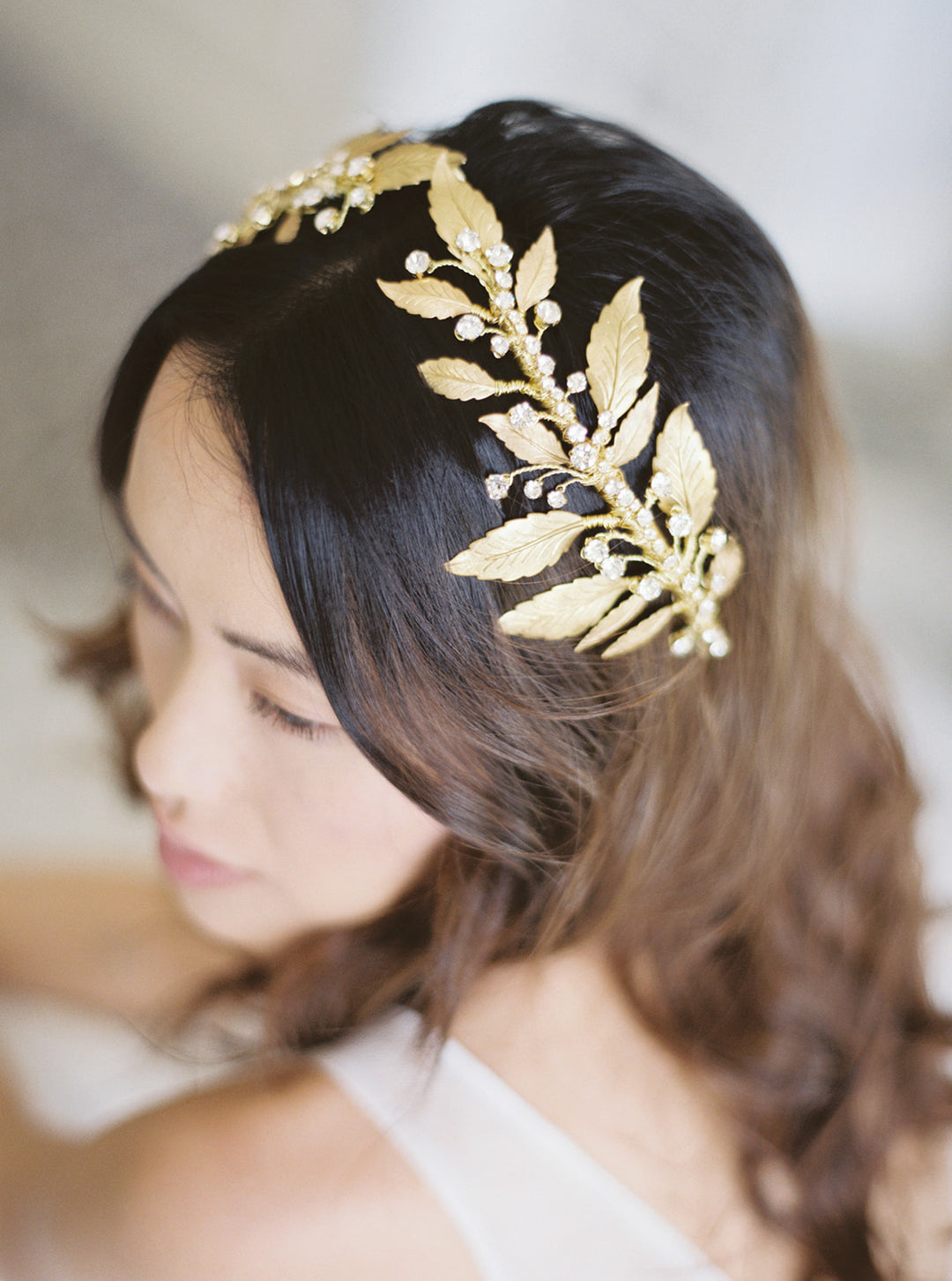 Gold wedding headpiece with crystals.