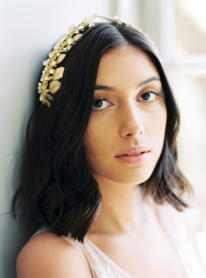 Gold wedding headpiece with crystals.
