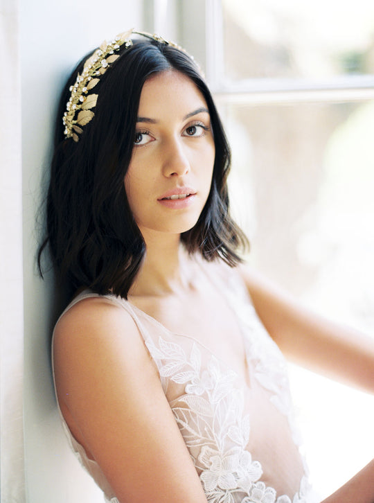 Gold wedding headpiece with crystals.