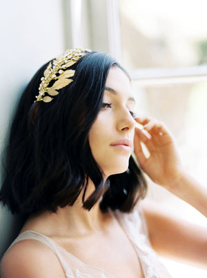 Gold wedding headpiece with crystals.