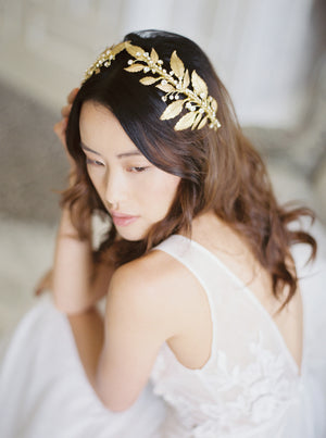 Gold wedding headpiece with crystals.
