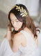 Gold wedding headpiece with crystals.