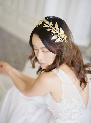 Gold wedding headpiece with crystals.