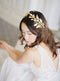 Gold wedding headpiece with crystals.
