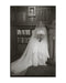 Grace Silk Blusher Veil on a bride standing in a historic, classic interior with bookcase. Moody black and white wedding photograph. 