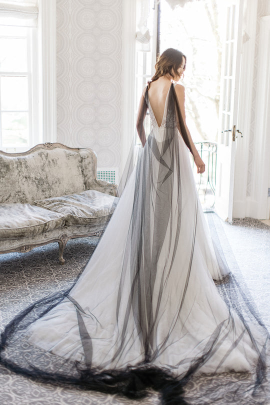 Black wedding cape with wide train.