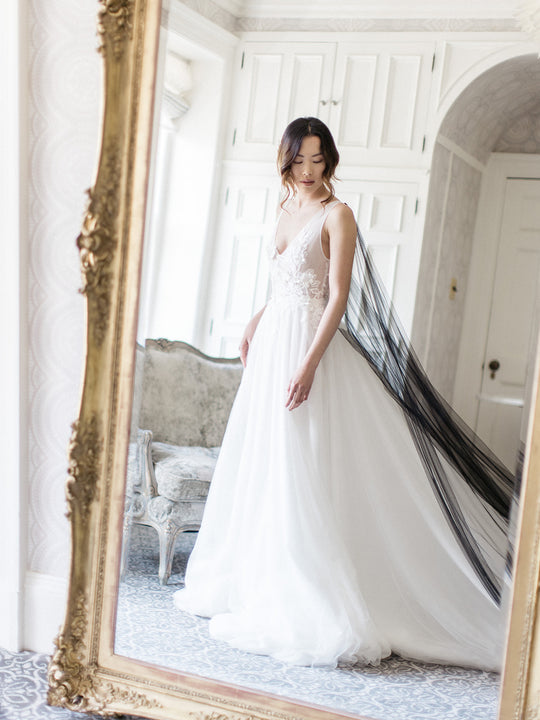Black wedding cape.