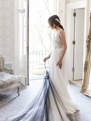 Black wedding cape made of soft tulle.