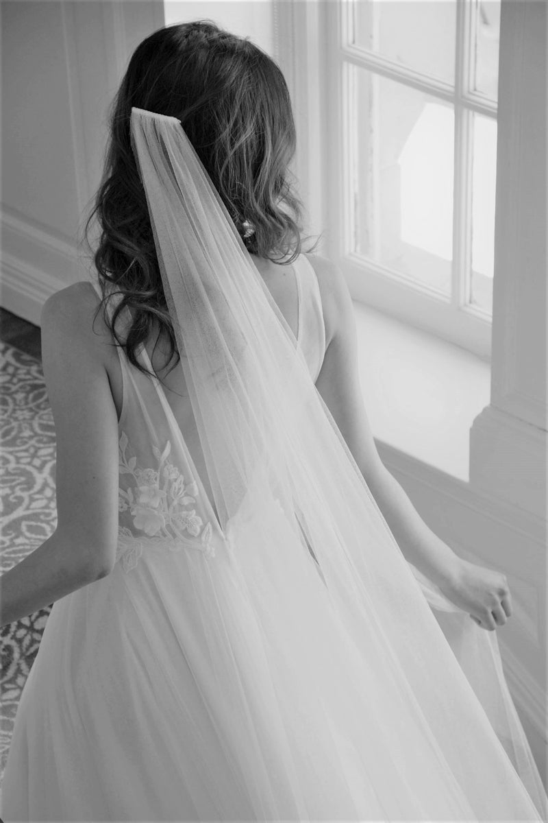 Pure silk wedding veil with hair down.