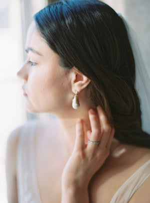 Baroque pearl drop earrings.