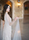 Detachable tulle wings.