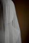 Detailed shot of the Monique silk wedding veil, showing the soft blusher draping over a headform.