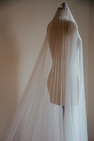Up close image of the back of the Monique silk veil, showing the softness and transparency of the silk tulle. 