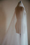 Up close image of the back of the Monique silk veil, showing the softness and transparency of the silk tulle. 