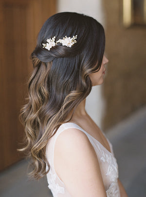 Blush bridal hair combs with long wedding hairstyle.