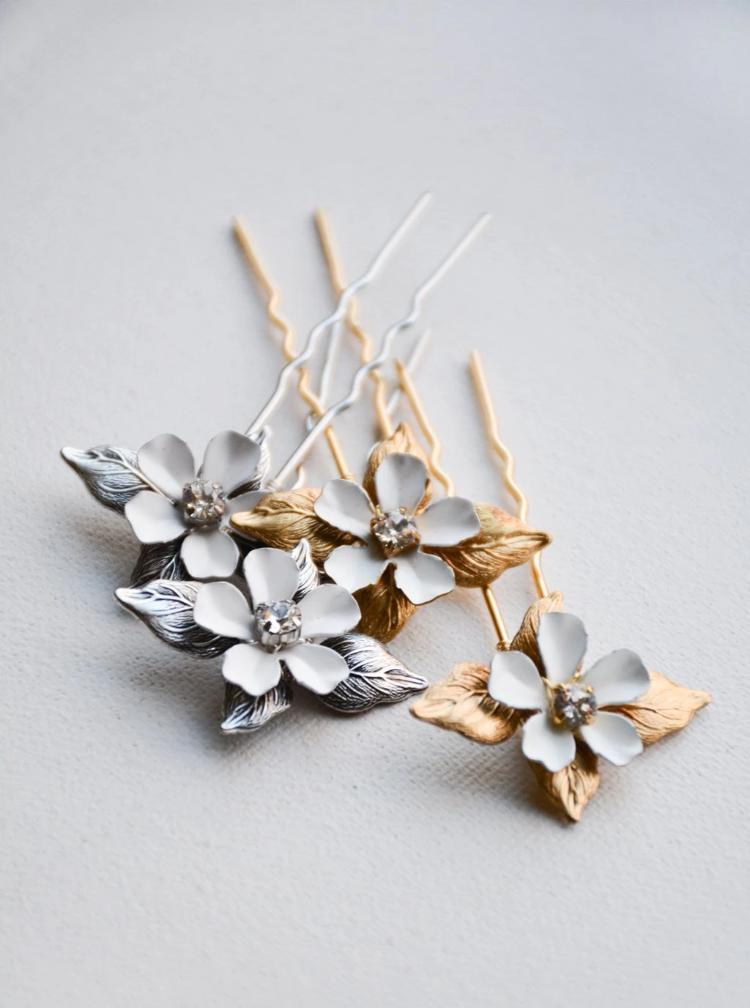 Floral hair pins in gold or silver.