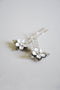 Floral hair pins in silver.