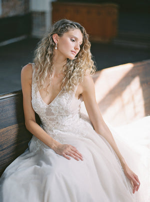 Crystal bridal earrings on bride.