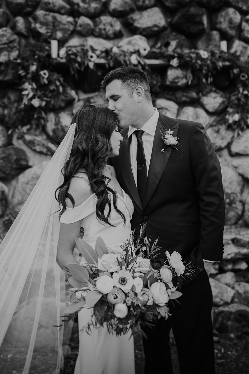 The Talitha wedding veil shown styled with hair down in soft waves.