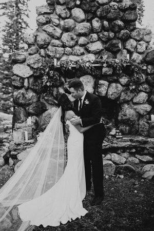 The Talitha wedding veil shown in cathedral length on a real bride.