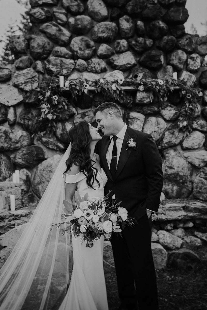 The Talitha long wedding veil shown styled with long hair down.