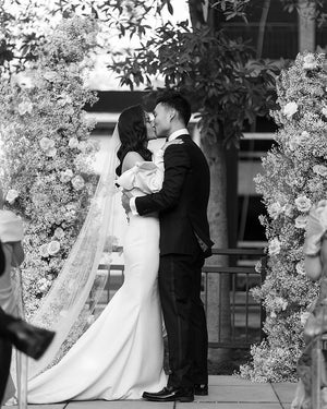 Elegant bride in the Talitha single-tier veil, styled with hair in soft waves.