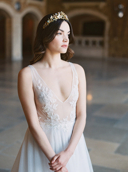 Floral wedding crown with butterflies.