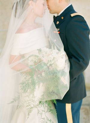Bridal veil with long blusher.