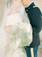 Bridal veil with long blusher.