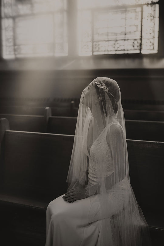 Bridal veil with blusher.