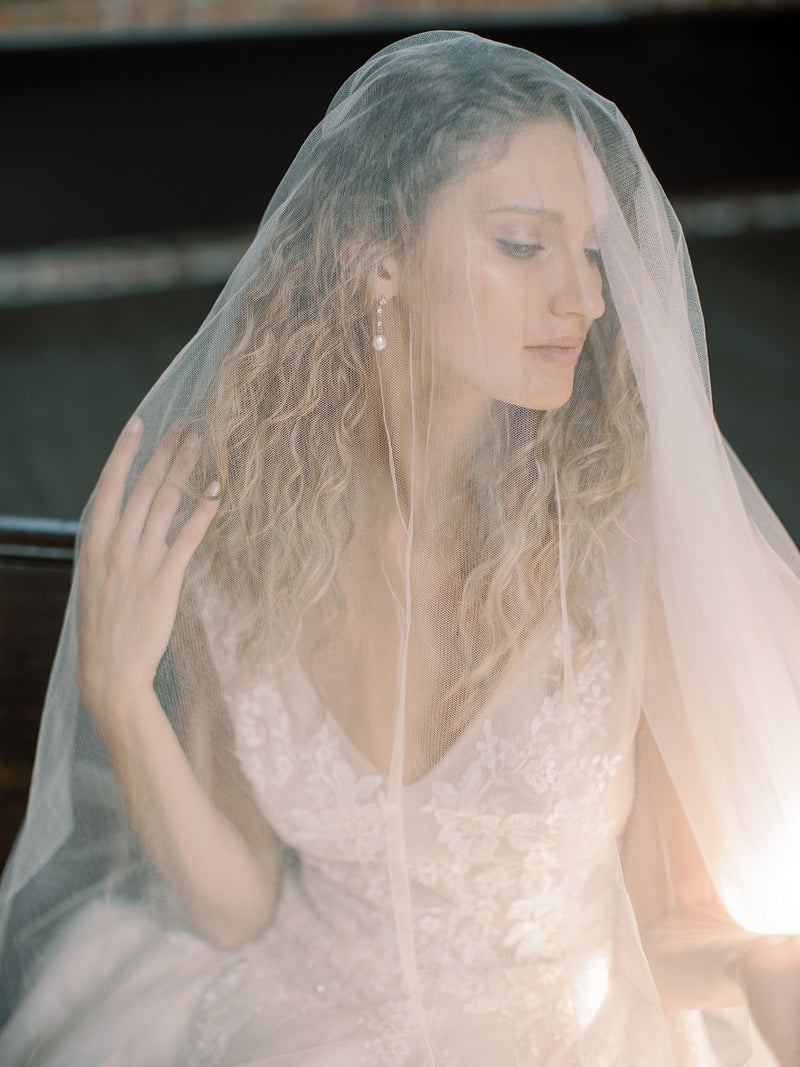 Detailed view of the Grace English Silk Blusher Veil with the soft, sheer tulle layer covering the bride's face.