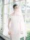Sheer wedding veil with blusher.
