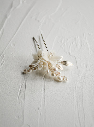 Lili floral wedding hair pin in silver.