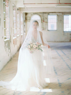 Bridal veil with long blusher.
