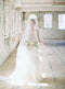 Bridal veil with long blusher.