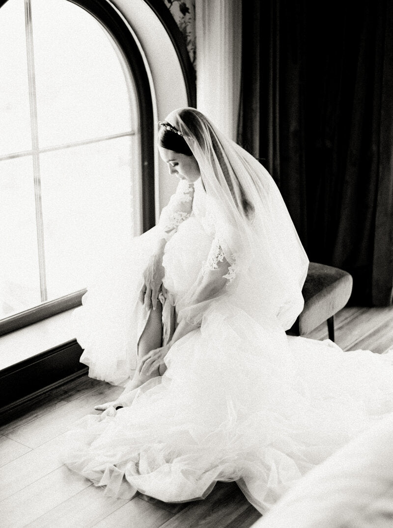 Bridal veil with long blusher.