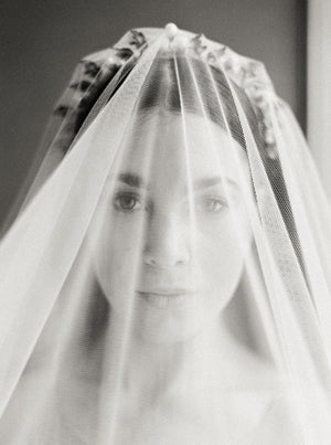 Bridal veil with long blusher.