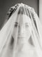 Bridal veil with long blusher.