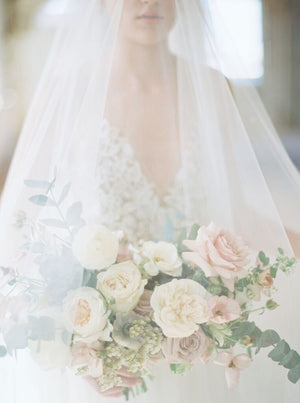 Bridal veil with long blusher.