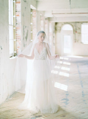 Bridal veil with long blusher.